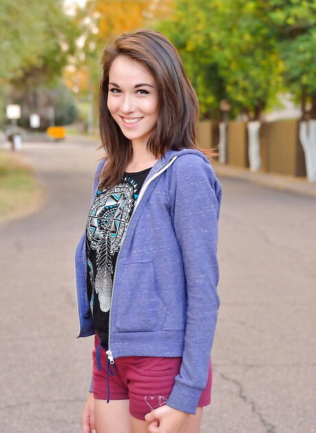 Svelte american dark-haired teen Emily Grey in sexy shorts exhibits tiny tits and sexy ass outdoor